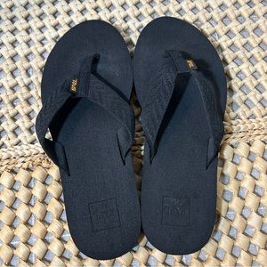 Teva black flip-flops, women’s size 9